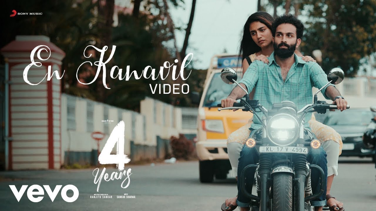 En Kanavil Lyrics