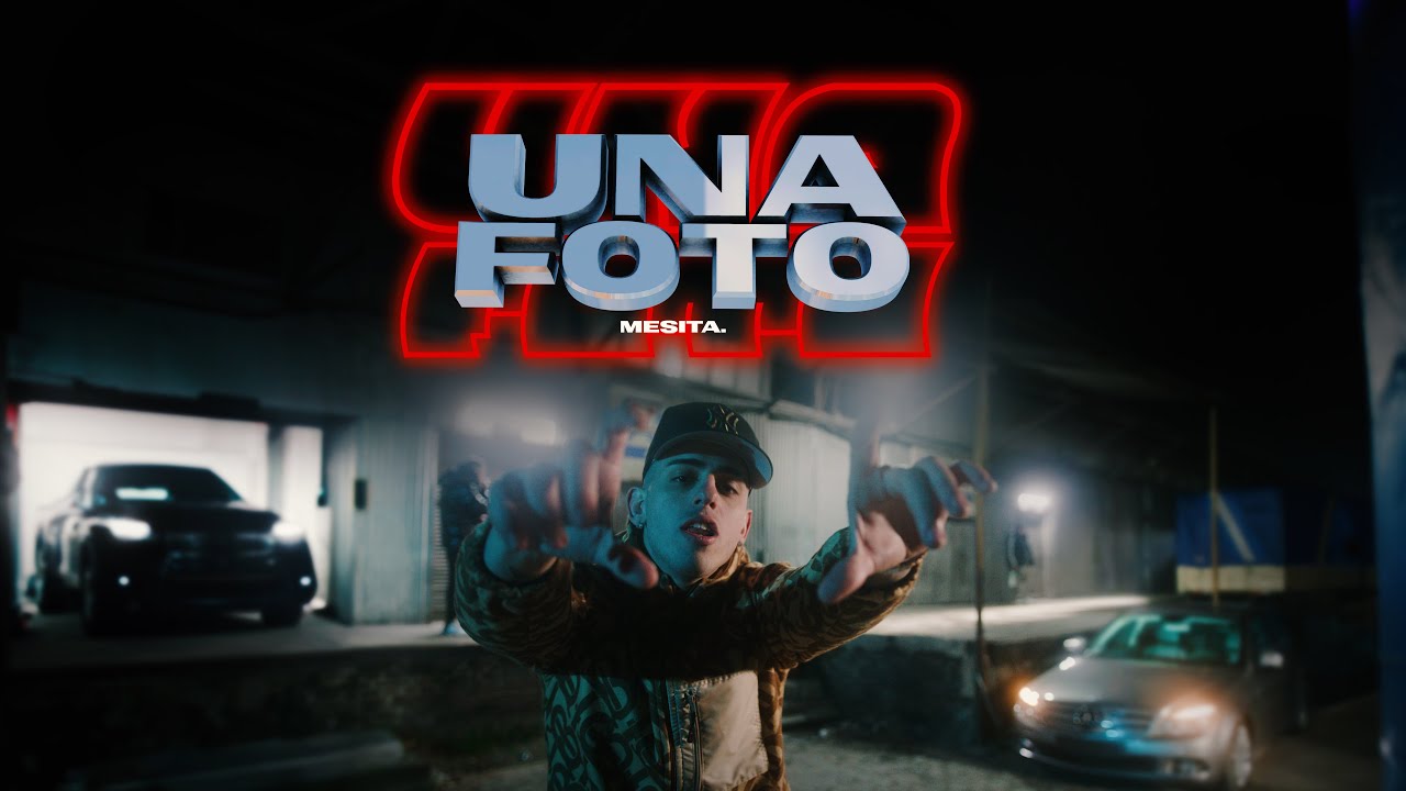 UNA FOTO Lyrics In English Translation|